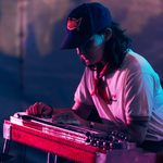 Freshers_Festival_HIGHLIGHTS_24_AF_web-res_APPROVED_21_rgb A student wears a baseball cap and plays a keyboard